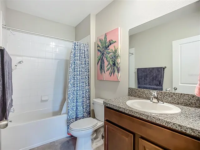 a bedroom with furniture and a couch