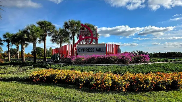 an aerial view of a house with a swimming pool
