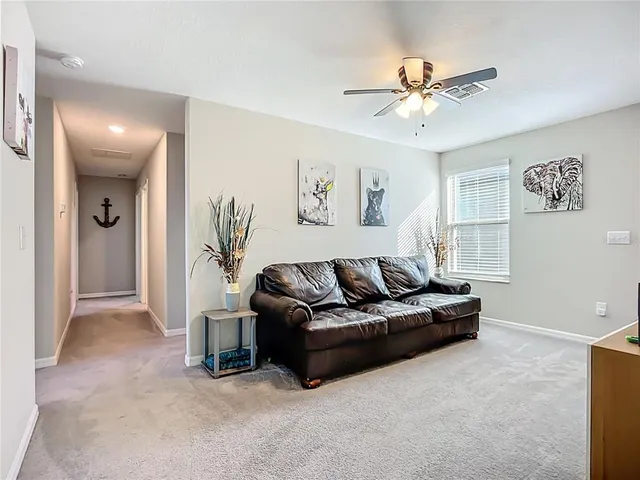 a view of a balcony with chair and table