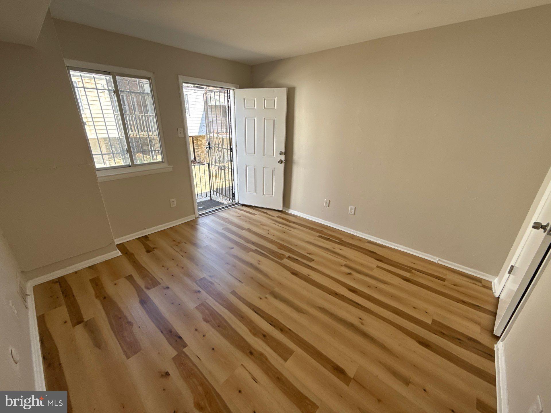 573 Allengrove Street Philadelphia, PA 19120 - Photo 16 of 16 573 - A. Bottom unit. Back door