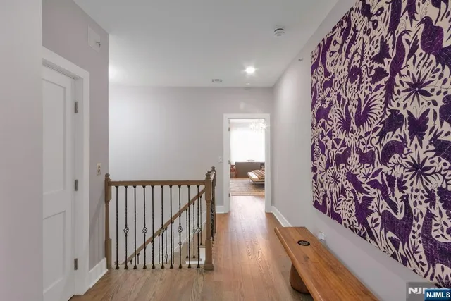 a view of entryway with wooden floor