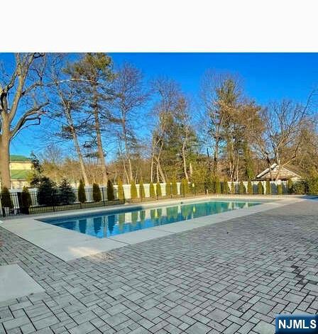704 Opus Way, Unit 704 Montvale, NJ 07645 - Photo 30 of 33 a view of swimming pool