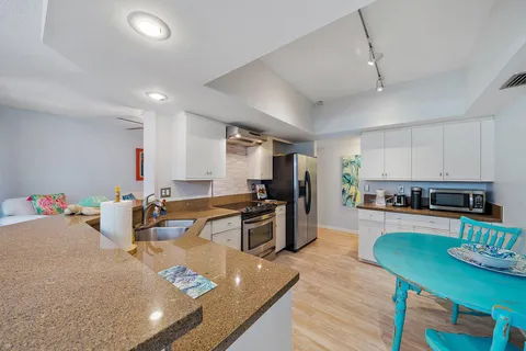 a bedroom with a bed and dresser