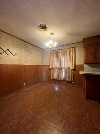 a view of a kitchen with a sink