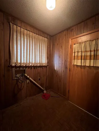 a view of a bathroom with a sink and a mirror