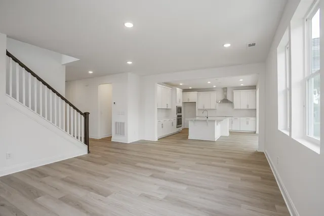 a view of kitchen with wooden floor