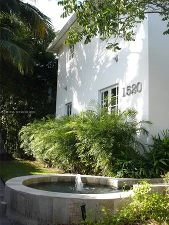 a view of fountain in a yard