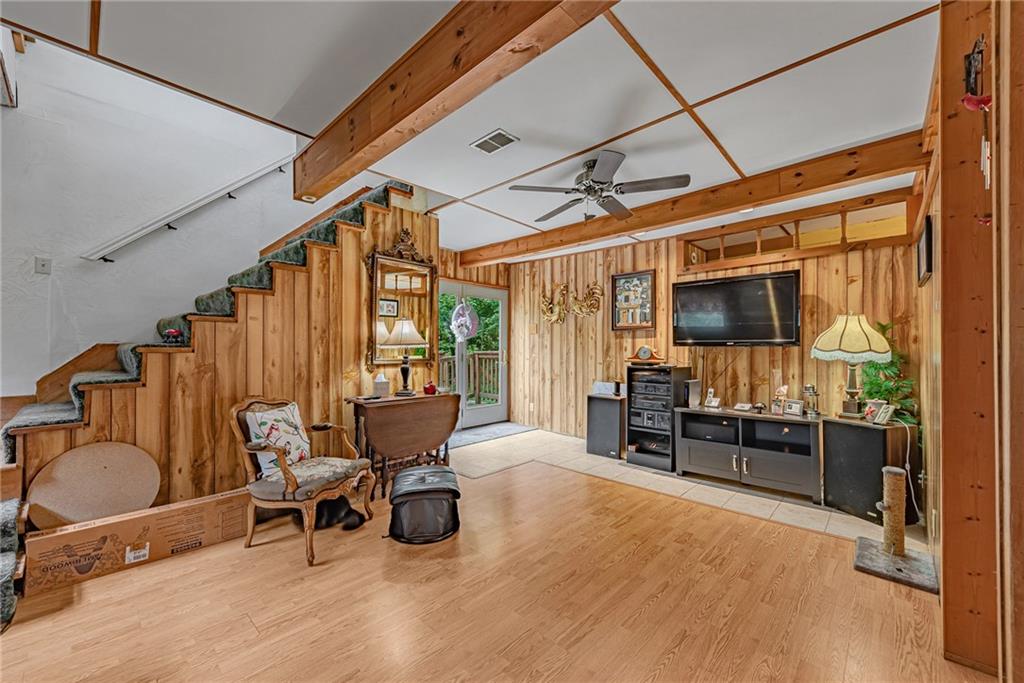 142 Westlake Road Acme, PA 15610 - Photo 20 of 25 a living room with furniture and a flat screen tv