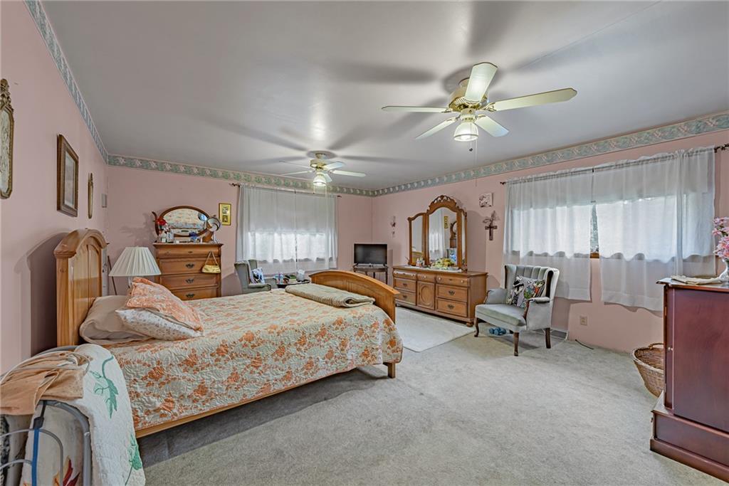 142 Westlake Road Acme, PA 15610 - Photo 21 of 25 a bedroom with bed and window