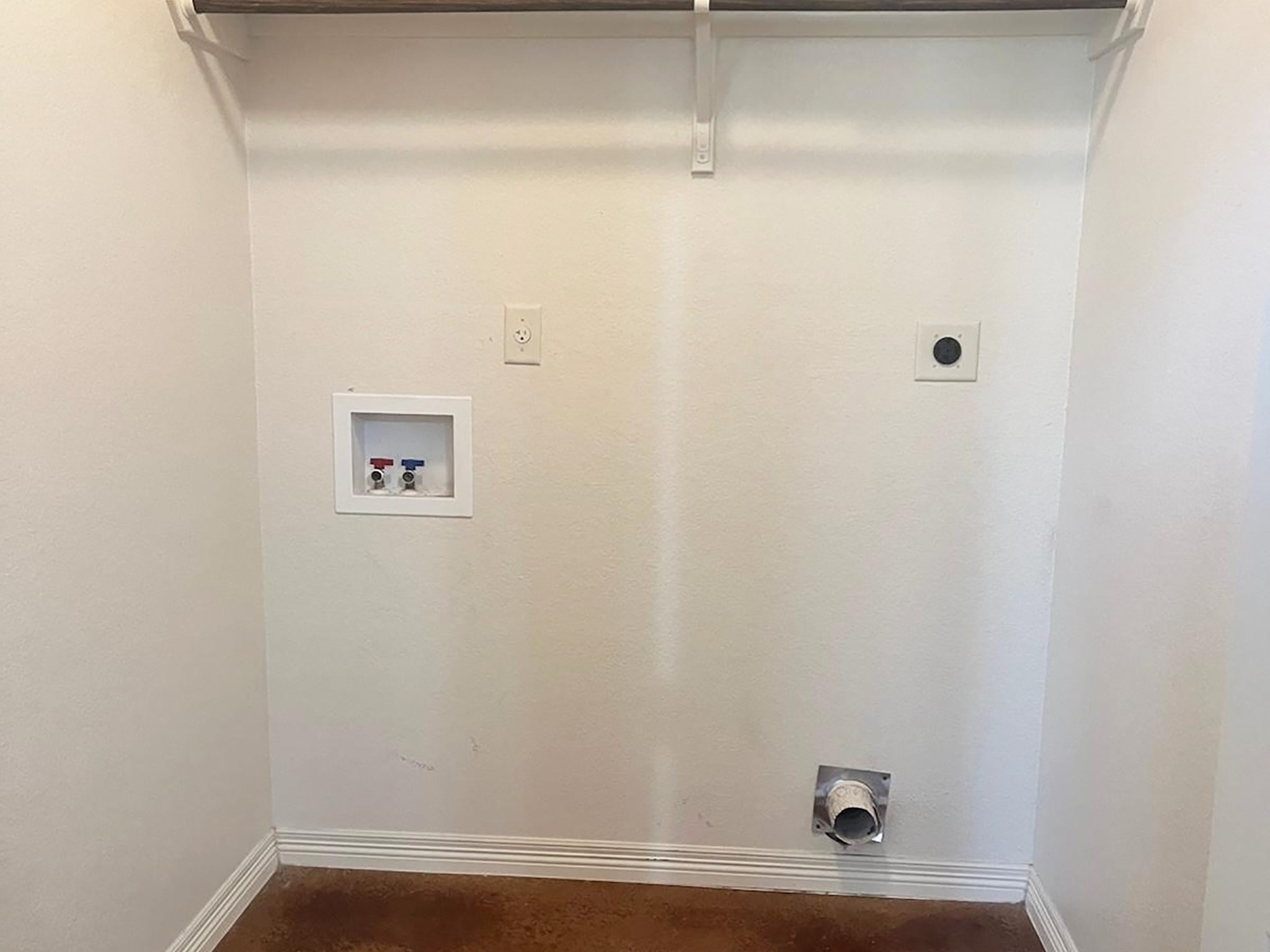 504 Karey Drive Temple, TX 76502 - Photo 13 of 18 Laundry room featuring electric dryer hookup, concrete flooring, and hookup for a washing machine