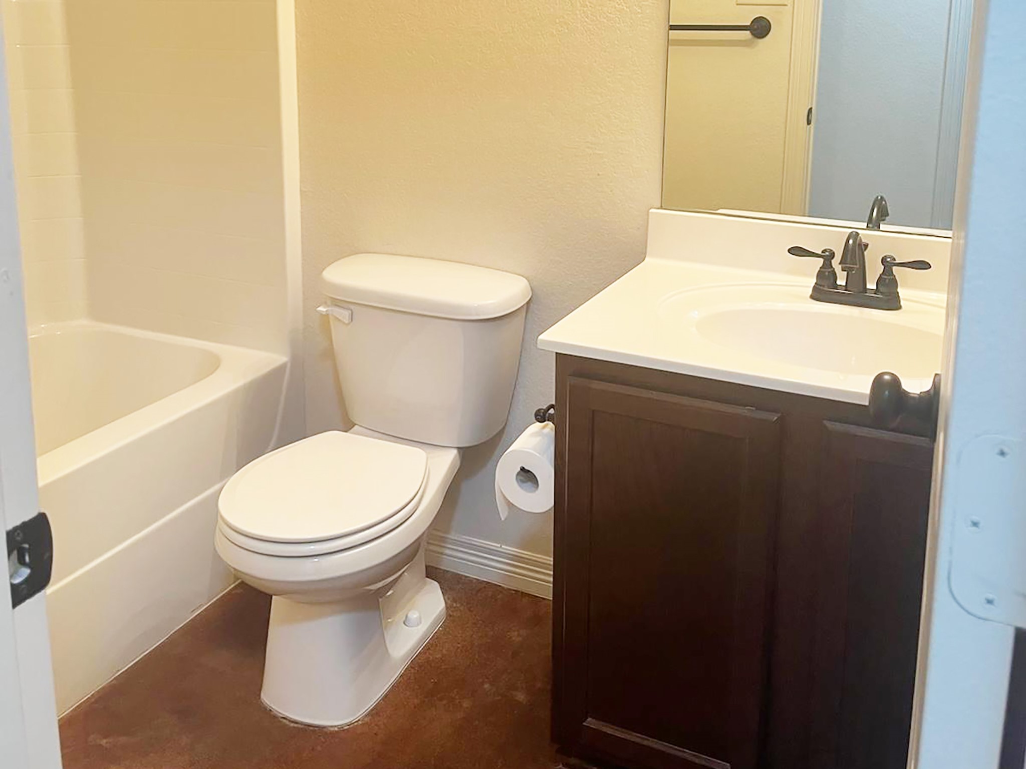 504 Karey Drive Temple, TX 76502 - Photo 14 of 18 Full bath featuring vanity, a textured wall, and shower / washtub combination