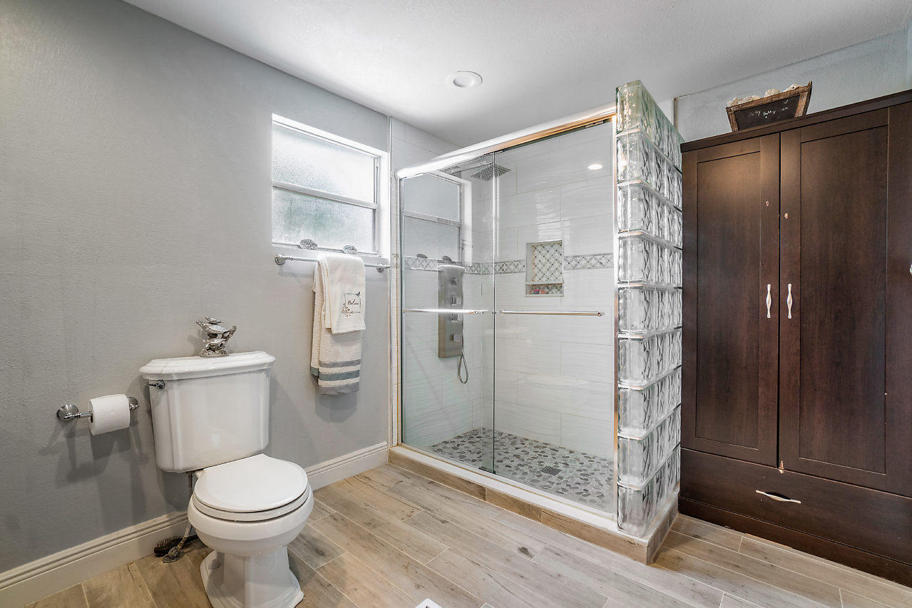 11941 Flotilla Place Boca Raton, FL 33428 - Photo 13 of 21 a bathroom with a toilet and a shower