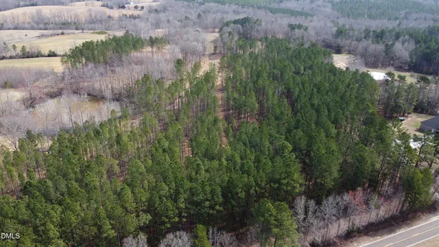 a view of a lake with a yard