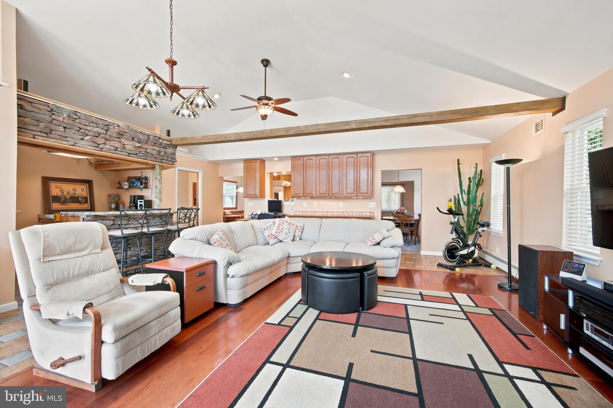 1004 Green Lane Secane, PA 19018 - Photo 9 of 49 a living room with furniture and a chandelier