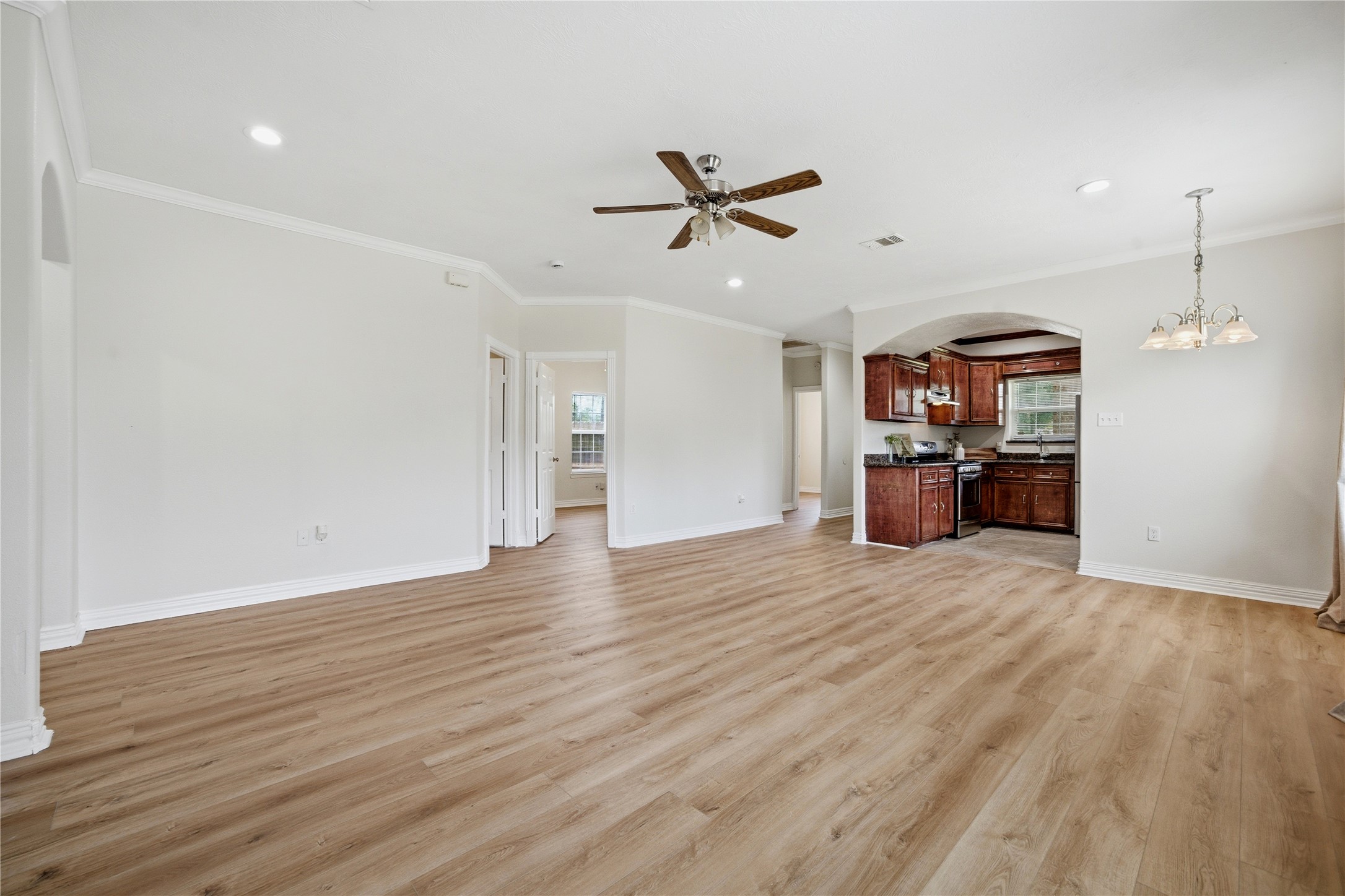 3001 Wayne Street Houston, TX 77026 - Photo 15 of 31 From this view of the living room, you can see the kitchen and the three secondary bedrooms