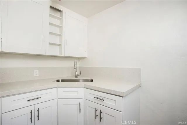 a view of cabinets with tap