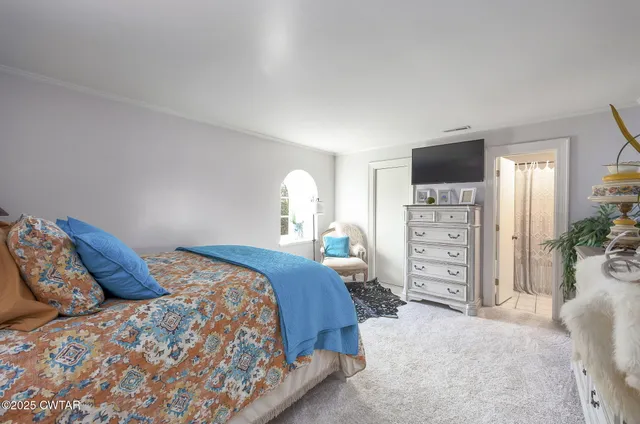 a view of a backyard with sitting area