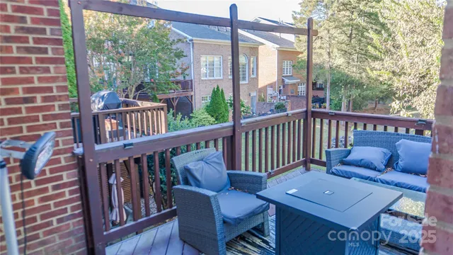 a view of a balcony with furniture