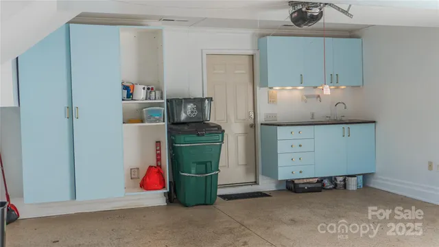 a room with cabinets and storage