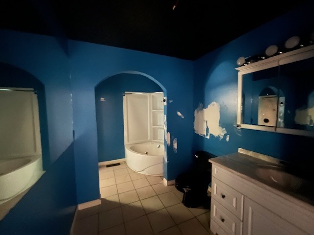 35 Sandy Point Goreville, IL 62939 - Photo 7 of 8 a bathroom with a toilet sink and mirror