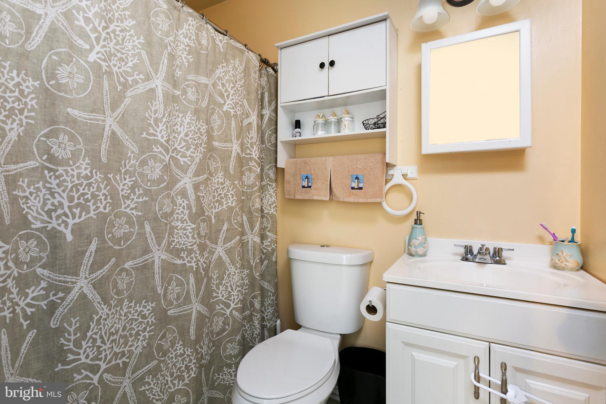 1638 Bay Ridge Road Edgewater, MD 21037 - Photo 11 of 21 Remodeled bathroom with modern vanity & tub/shower