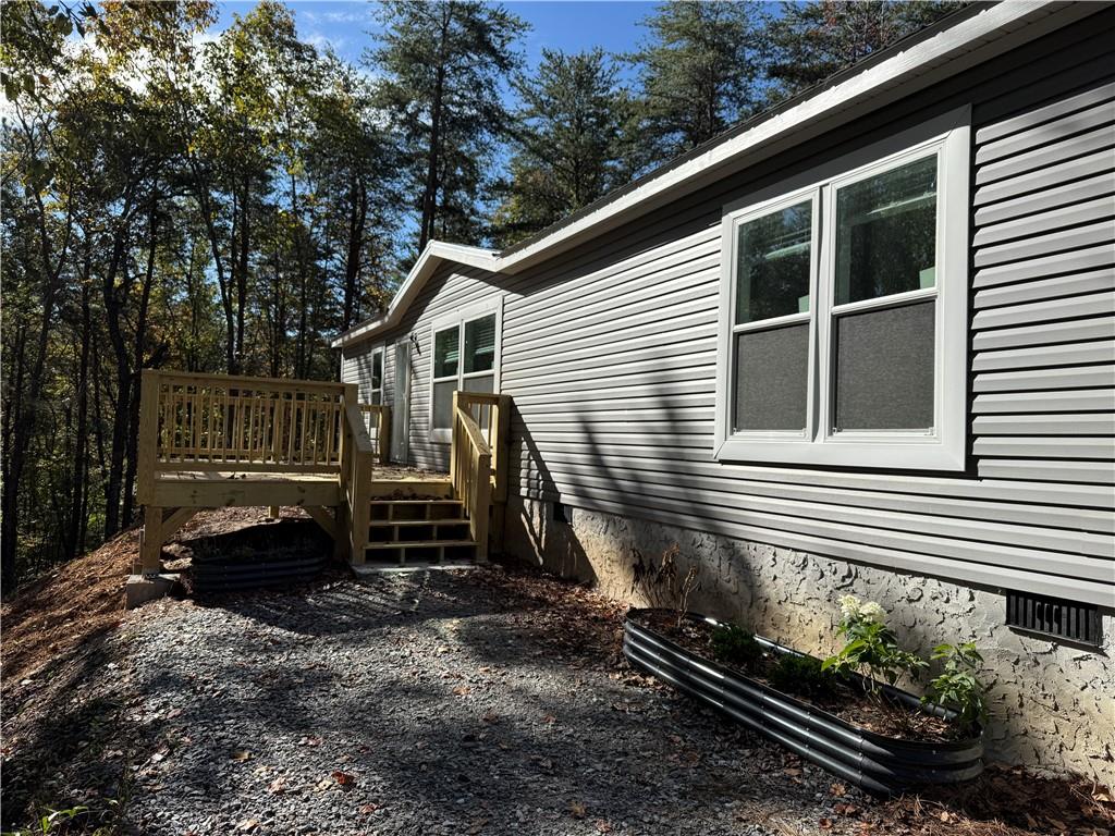 57 Highland Tree Court Ranger, GA 30734 - Photo 3 of 39 a front view of a house