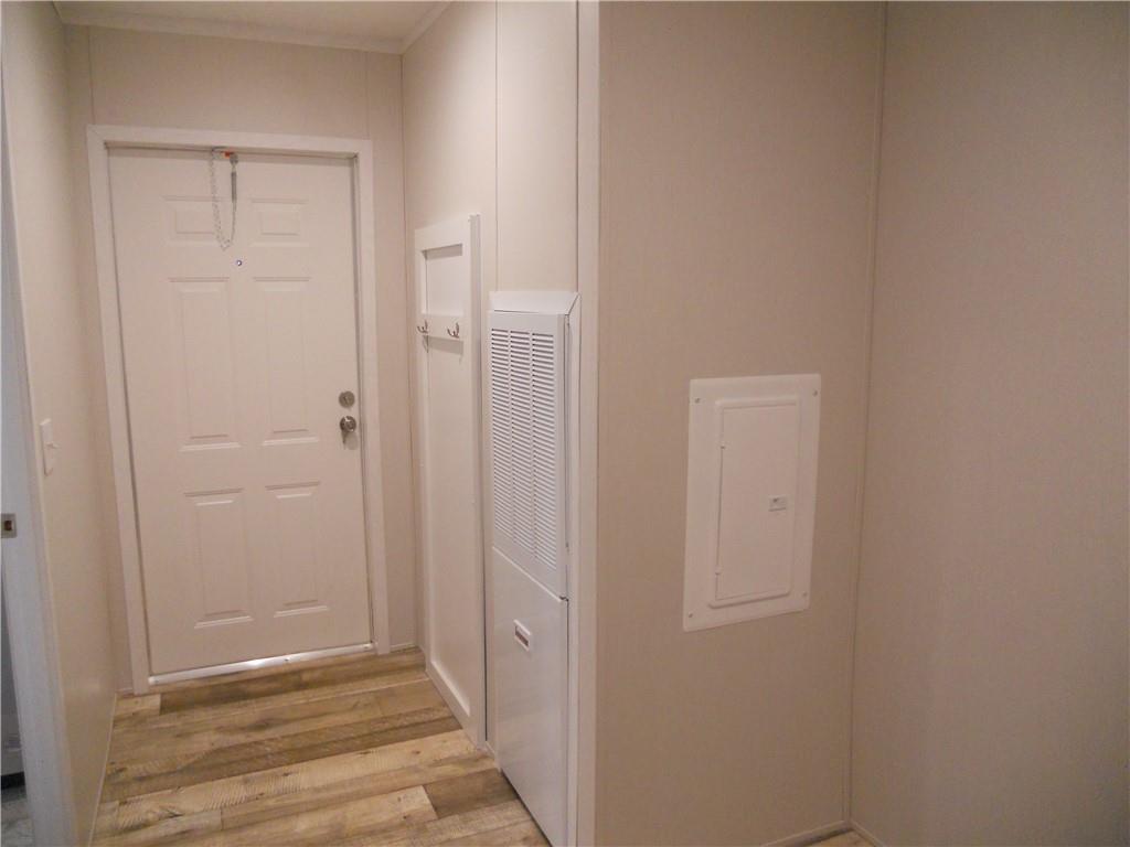 57 Highland Tree Court Ranger, GA 30734 - Photo 36 of 39 a view of a hallway with wooden floor