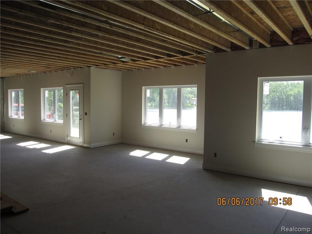 1456 Clark Lake Road Brighton, MI 48114 - Photo 14 of 17 Super Spacious Walkout Basement on Lake