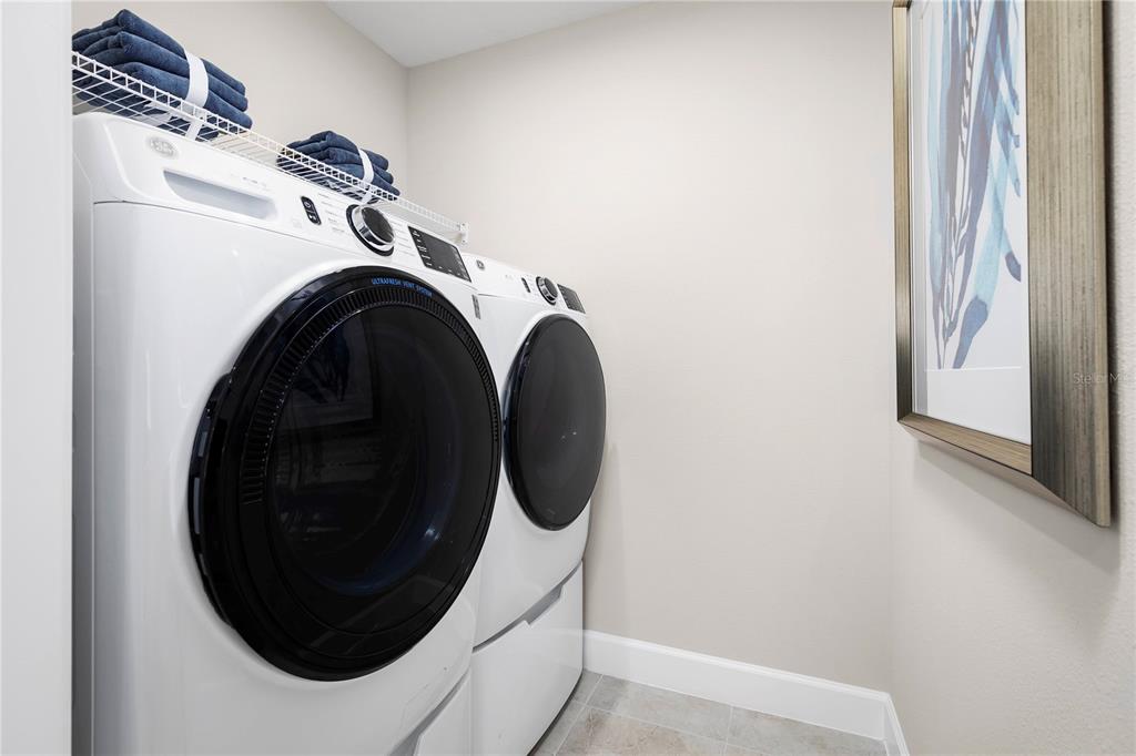 2518 White Ladyfish Road Wimauma, FL 33598 - Photo 21 of 21 a close view of washer and dryer