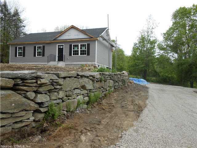 129 Buntz Road Canterbury, CT 06331 - Photo 1 of 1 a view of a house with a yard