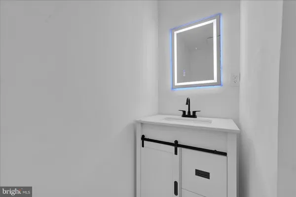 a bathroom with a toilet and a bathtub