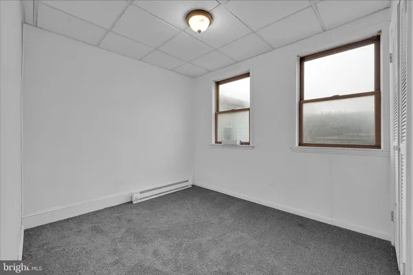 an empty room with window