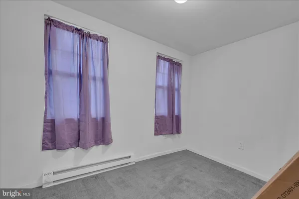 an empty room with an entryway