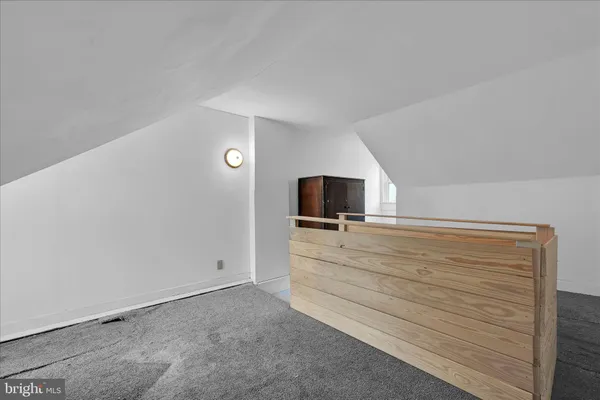 a bathroom with a toilet and a sink