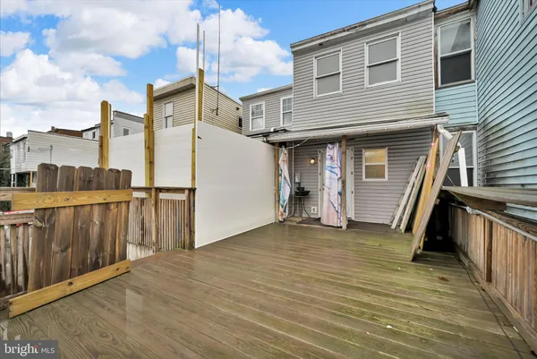 a view of a house with entrance gate