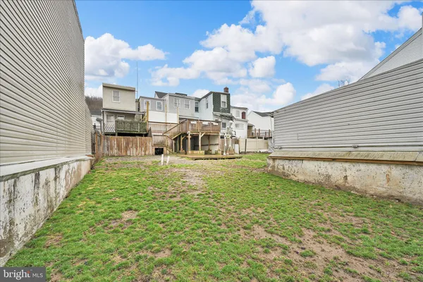 a spacious bathroom with a sink toilet and shower