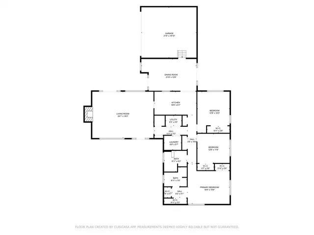 a view of a backyard with wooden fence and large trees