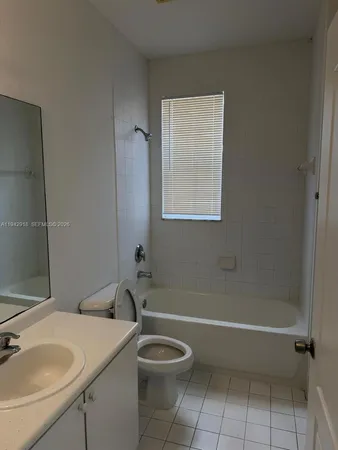 a bathroom with a sink and a bathtub