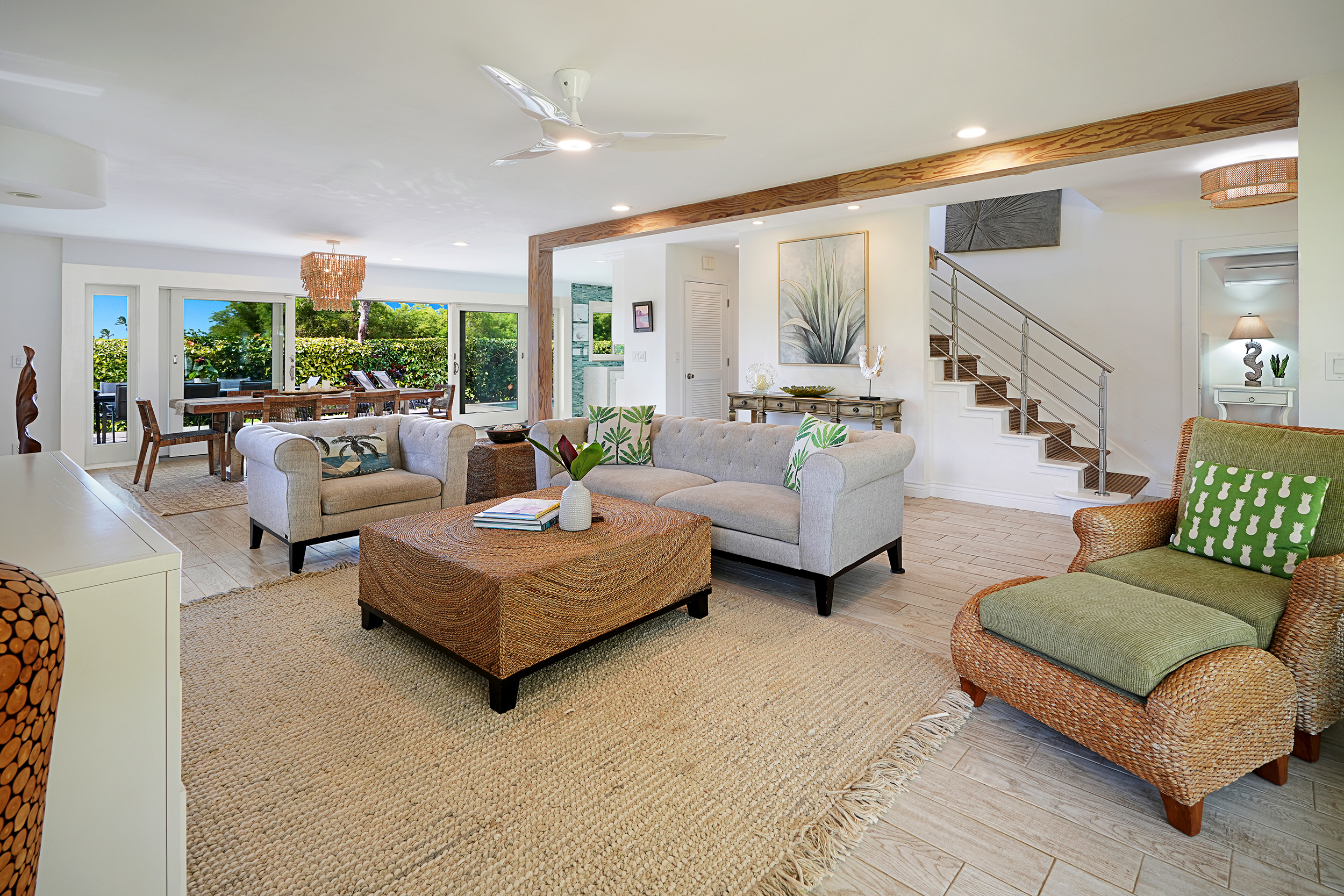 5348 Honoiki Road Princeville, HI 96722 - Photo 6 of 25 a living room with furniture and a large window