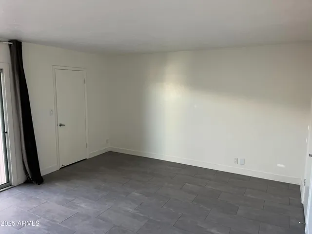 an empty room with closet