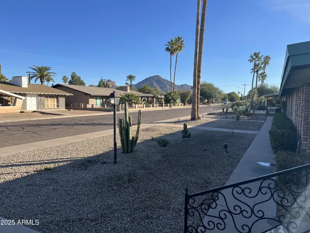 a view of a terrace with wooden fence