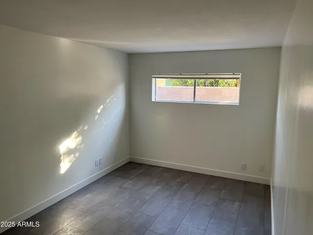 a view of a balcony with a potted plant