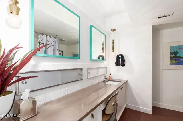 a view of a backyard with sitting area