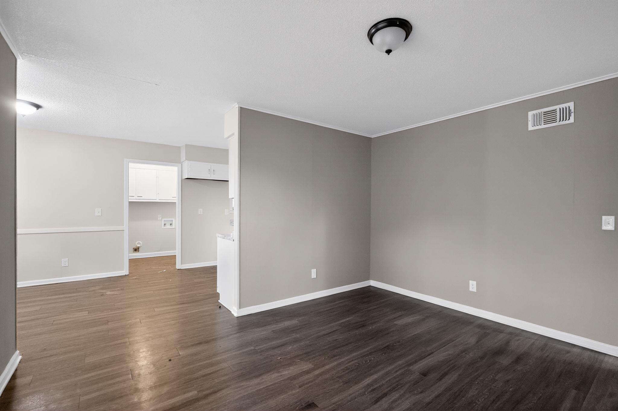 3124 Boone Street Memphis, TN 38127 - Photo 1 of 30 wooden floor in an empty room with a window