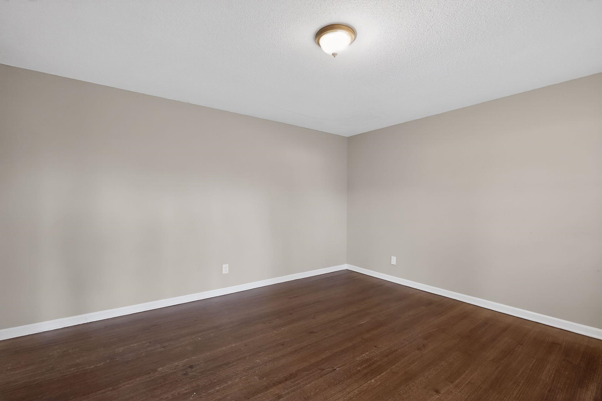 3124 Boone Street Memphis, TN 38127 - Photo 21 of 30 a view of an empty room with wooden floor
