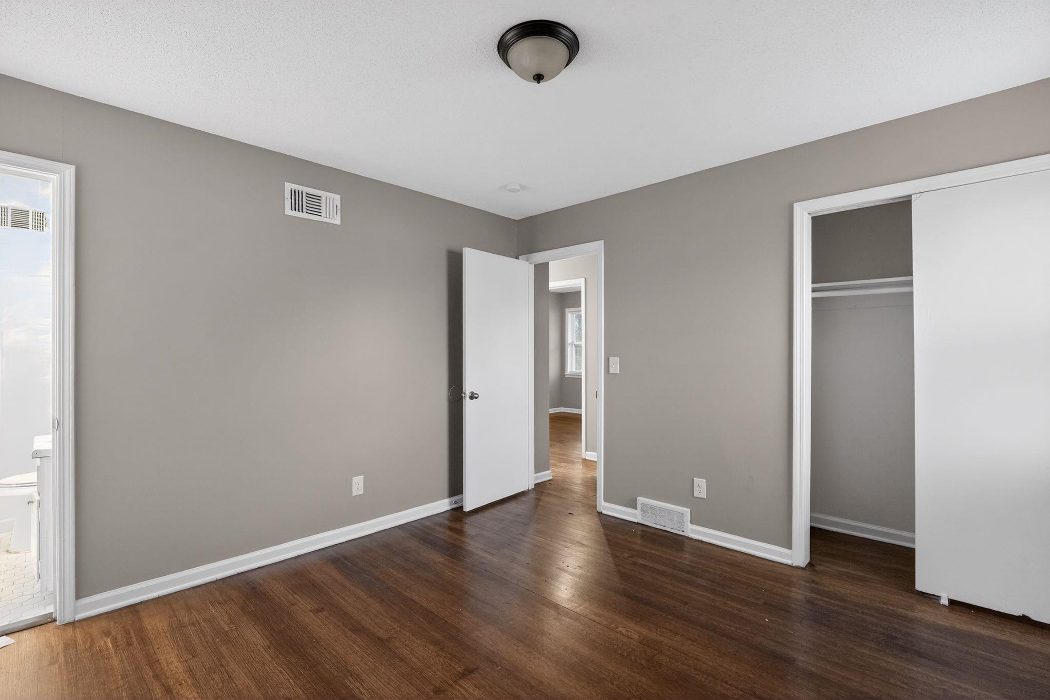 3124 Boone Street Memphis, TN 38127 - Photo 24 of 30 a view of an empty room with wooden floor