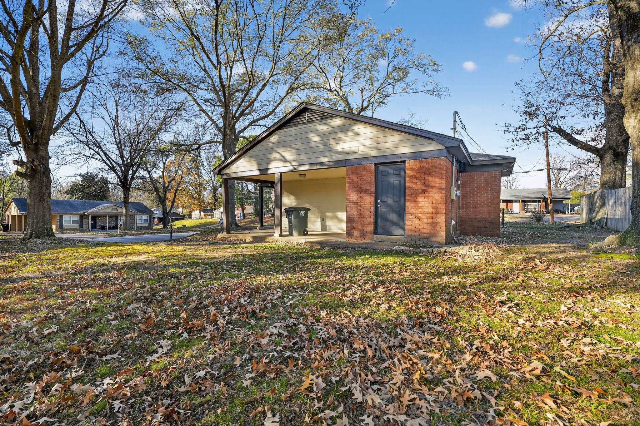 3124 Boone Street Memphis, TN 38127 - Photo 29 of 30 a view of a house with a yard