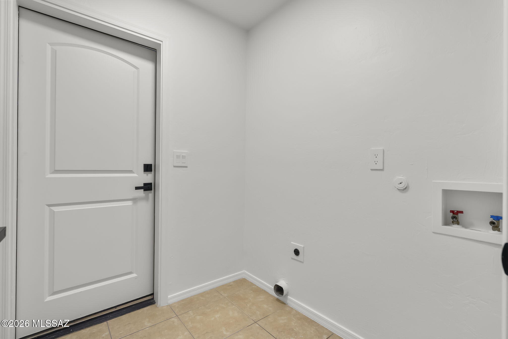 1079 Paseo Freno Rio Rico, AZ 85648 - Photo 22 of 28 Laundry room