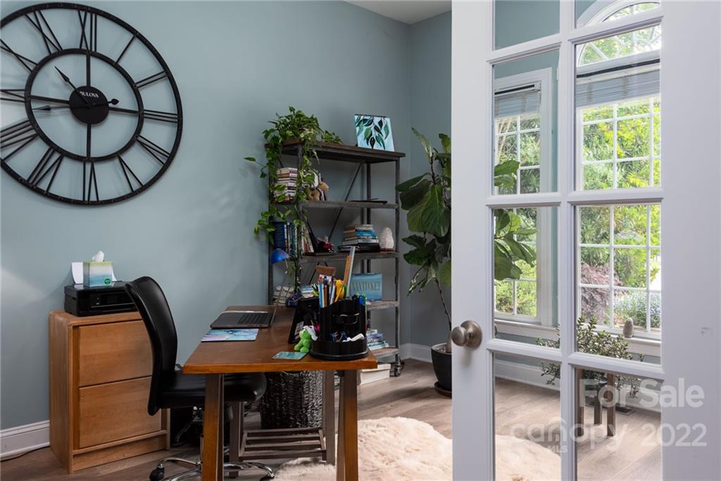 8804 Brentfield Road Huntersville, NC 28078 - Photo 11 of 39 a view of a dining room with furniture window and wooden floor