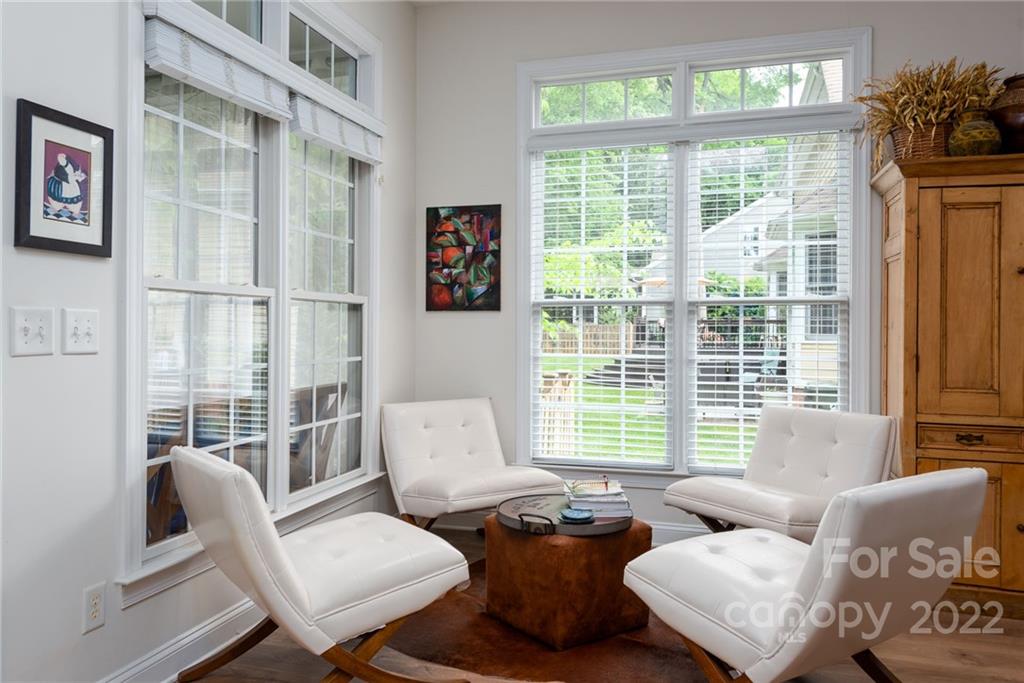 8804 Brentfield Road Huntersville, NC 28078 - Photo 19 of 39 a living room with furniture and a large window
